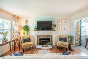 Step into Hello Sunshine's mid-century vibe in our cozy living room. Featuring a fully functional wood-burning fireplace (firewood not provided) and a 55" 4k Roku TV, our living room is another perfect setting for vacation nights in.