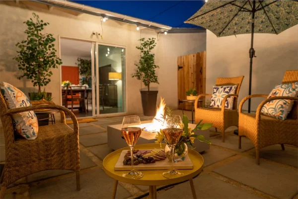 Unwind after a day of sightseeing on our serene back patio just off the bonus room, the ultimate spot to savor a refreshing adult beverage and relax. The comfortable outdoor furnishings and adjustable LED lighting set the perfect mood for an evening in.